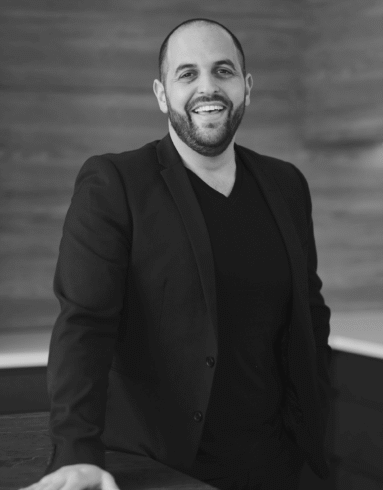 Black-and-white professional portrait of Trendsetter Homes director Michael Agostino.