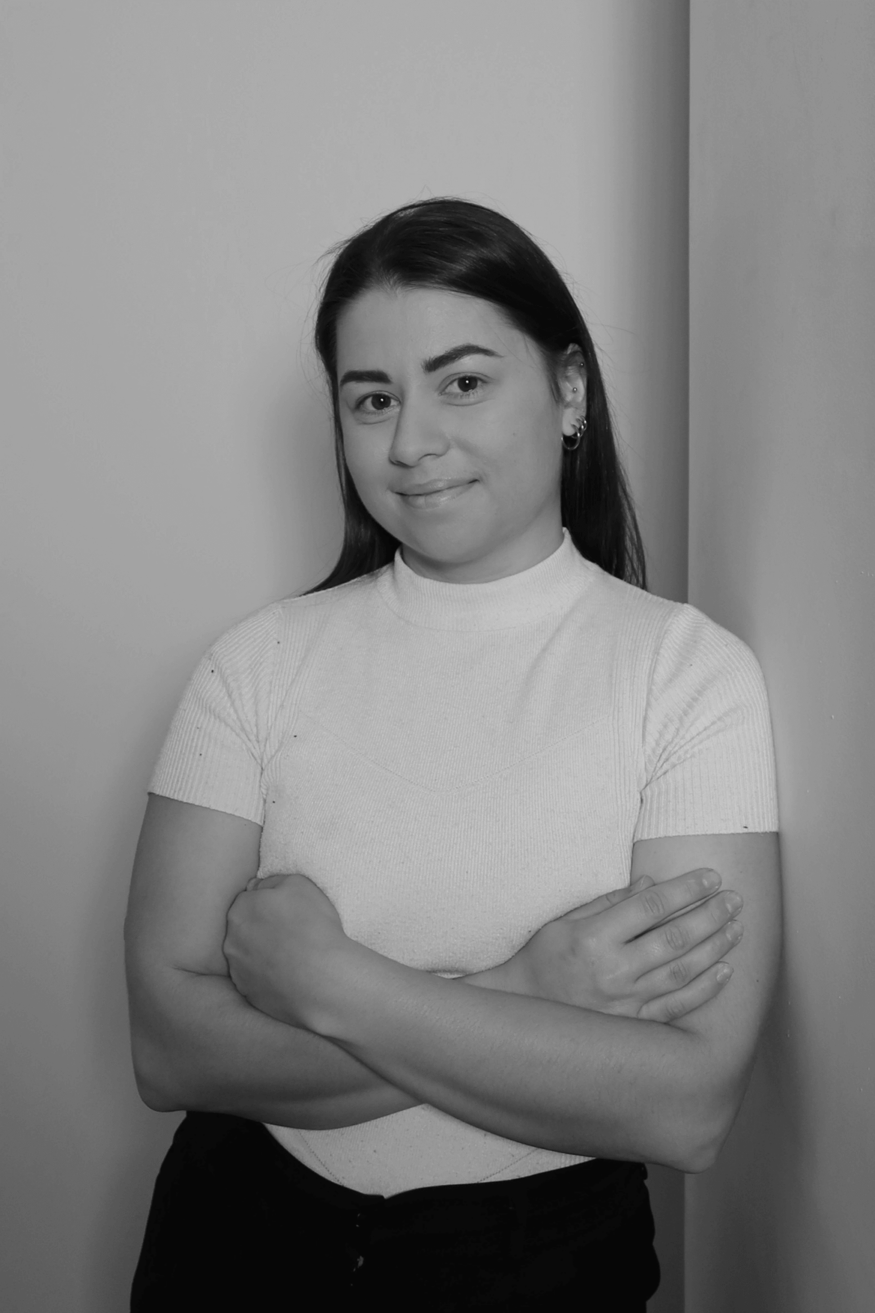 Black-and-white professional portrait of Penny Rutter, Project Coordinator at Trendsetter Homes.