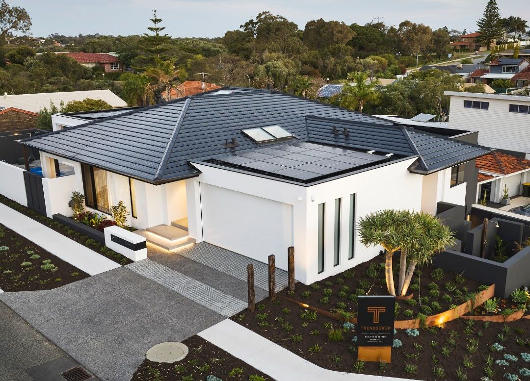 Aerial view of a custom home in Marmion, Perth, featuring a modern roof design and landscaped surroundings.