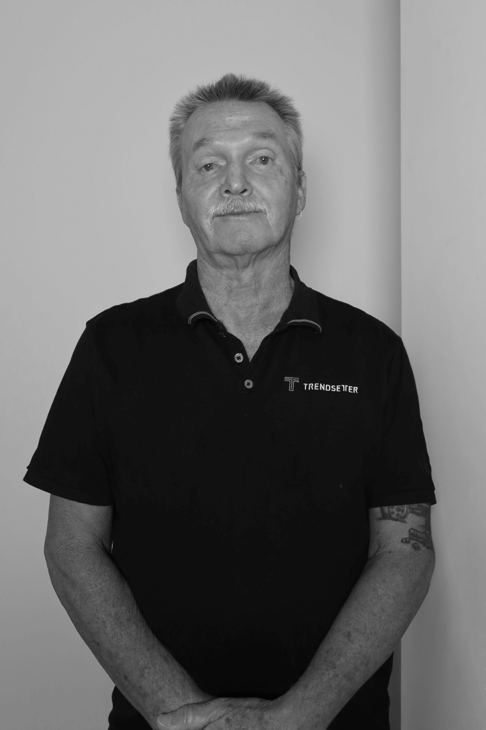 Black-and-white professional portrait of Maintenance Manager, Alan Fowler from the Trendsetter Homes team.