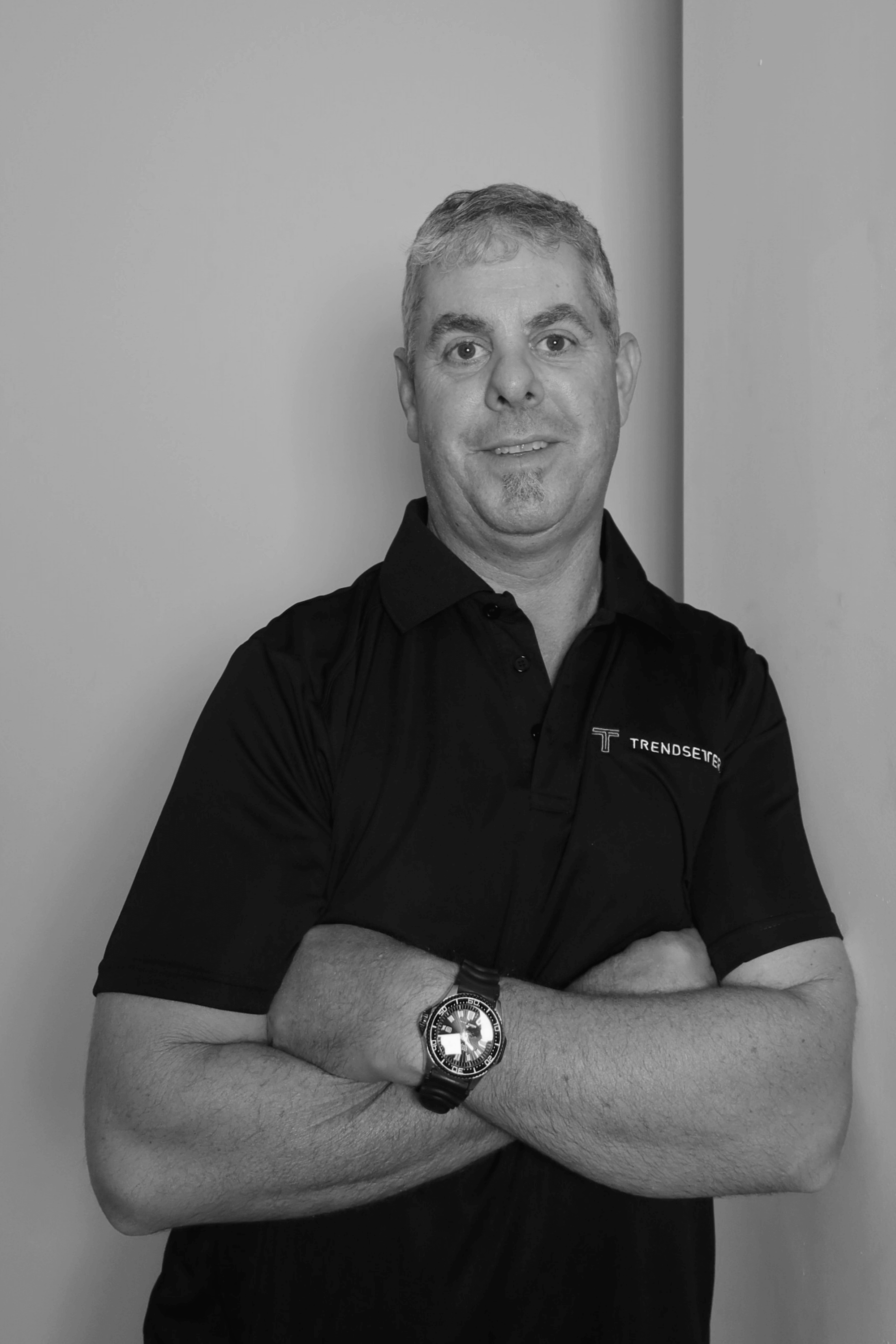 Black-and-white professional portrait of Site Manager, Simon Anderson from the Trendsetter Homes team.