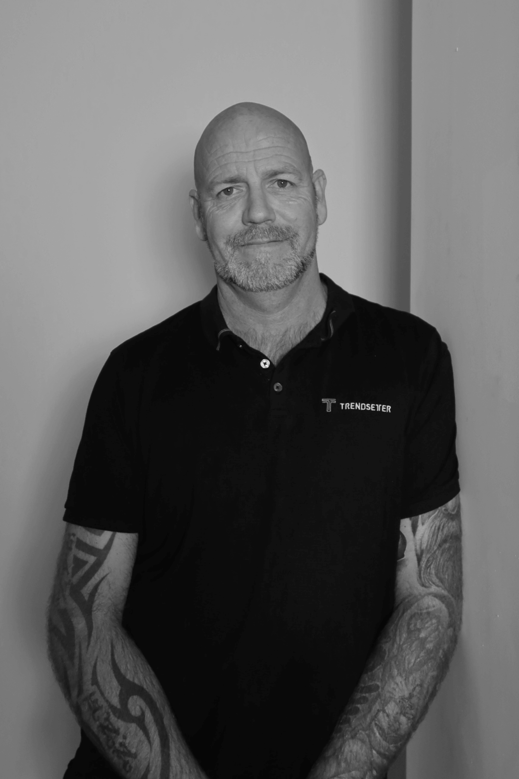 Black-and-white professional portrait of Site Manager, Steve Norman from the Trendsetter Homes team.