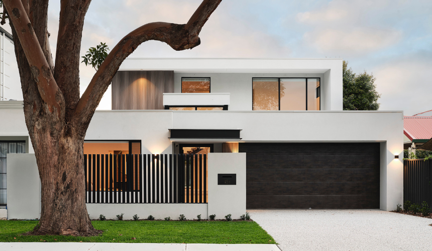 Exterior of a contemporary Ardross custom home featuring contrasting materials, large windows and modern architectural detailing.