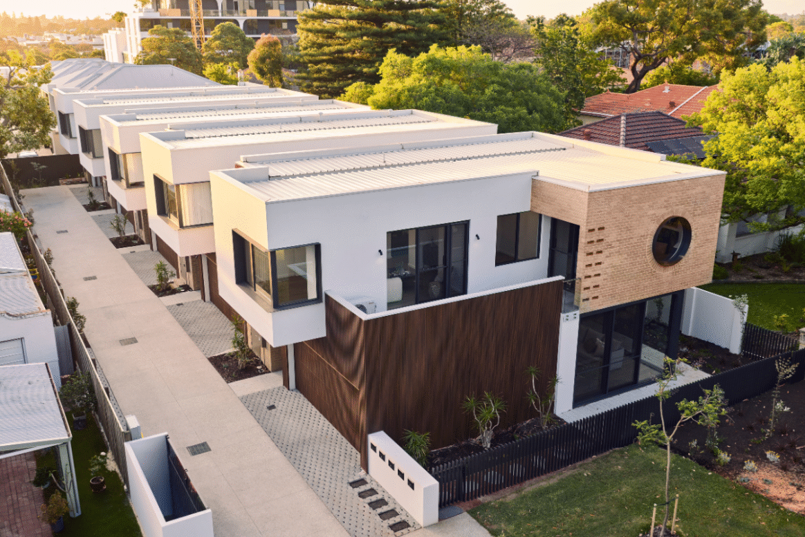Aerial view of a contemporary residential development in Nedlands featuring modern architectural forms and landscaped surroundings.