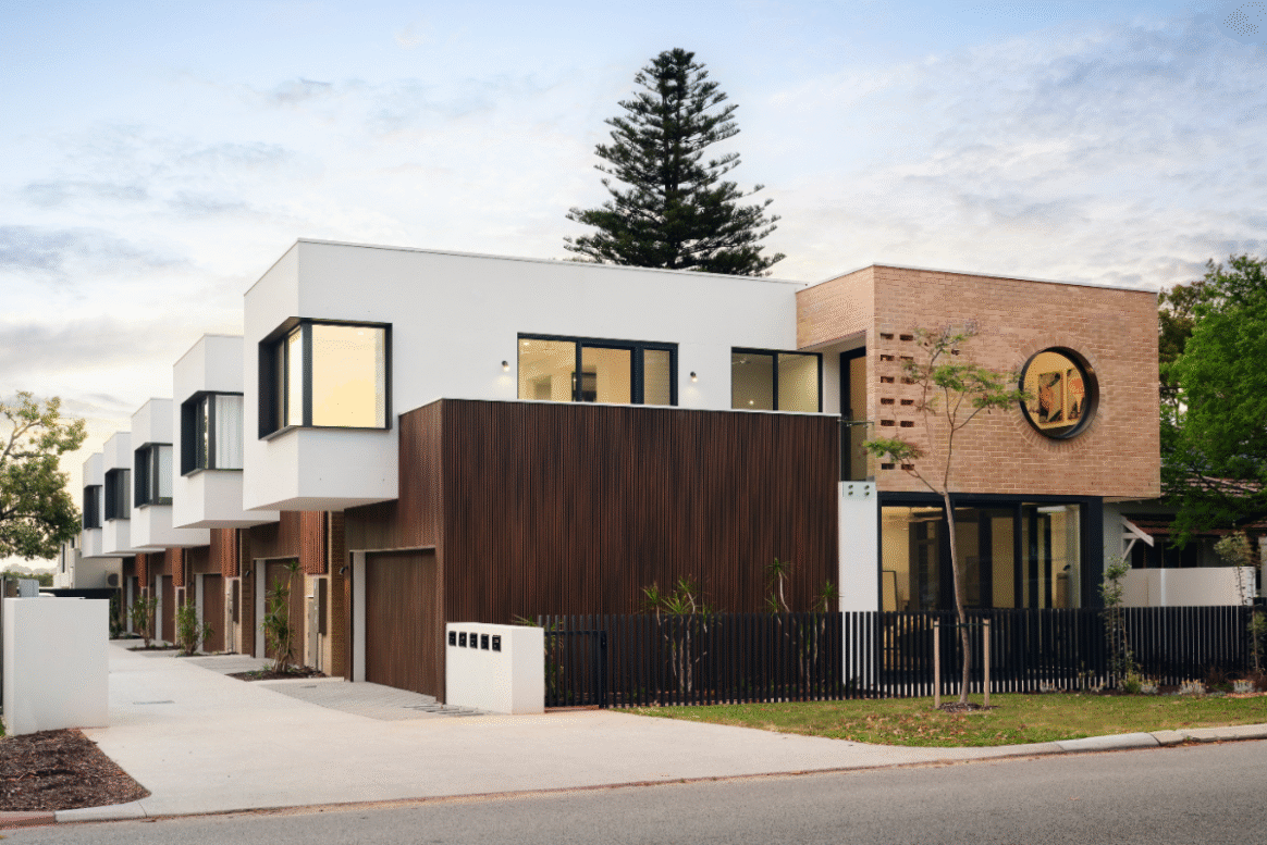 Contemporary residential development in Nedlands featuring brickwork, curved architectural details and contrasting exterior materials.